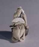 unknown Ceramic Figurine  - Man Holding Fan<br>1.5 x 1.5 x 2.0