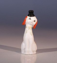 unknown Ceramic Dog Figurine with<br>Black Hat and Red Ears
