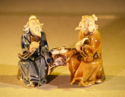 unknown Miniature Ceramic Figurine<BR>Two Men Sitting at a Table with Fine Detail<BR> Color: Blue & Brown