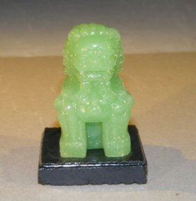 unknown Miniature Glass Chinese Foo Lion with Wooden Stand