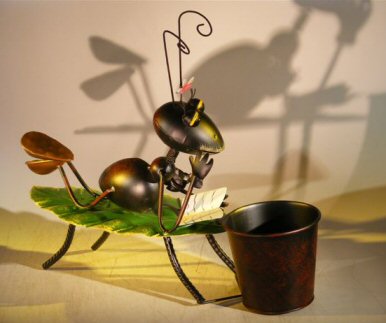 unknown Metal Ant Garden Pot Decoration with Movable Head and Attached Pot Holder<br>16.0 x 5.0 x 14.0 Tall