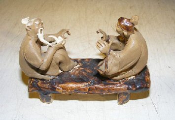 human miniature ceramic statue