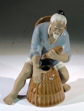 human miniature ceramic statue