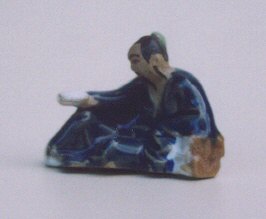 Man Reading Book  (blue) Ceramic Figurine - 2.25x2.0