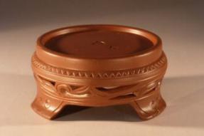 Carved Unglazed Ceramic Stand<br>Red/Brown