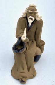 Miniature Ceramic FigurineMud Man with Pipe - 2.5