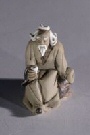 Ceramic Figurine  - Man Holding Cup 1.25