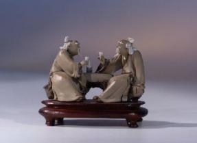 Miniature Mudman Figurine<br>Two Men Sitting at Table<br>Wood Display Table Included<br> 