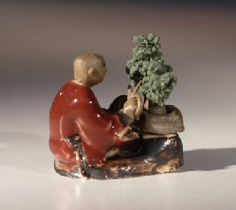 Man Trimming Bonsai Tree<br>Ceramic Mud Figurine