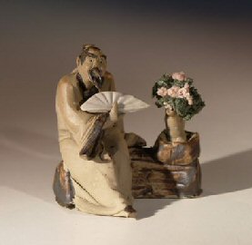Man Holding Fan with Bonsai Tree<br>Miniature Ceramic Mud Figurine