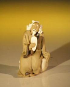 Man Holding Tablet<br>Miniature Ceramic Mud Figurine