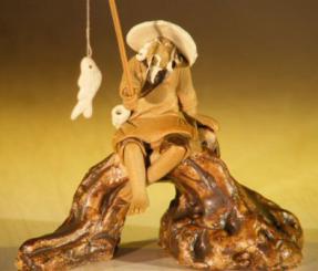 Miniature Ceramic Fisherman Figurine<br>Fisherman Sitting On A Log - Unglazed
