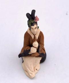 Female Musician Mud Figurine<br>Playing Wind Instrument