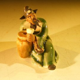 Ceramic Miniature Colored Figurine Man with Jug Holding Cup