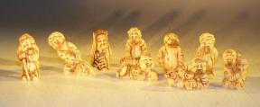 Nine Piece Chinese Resin Buddha Figure Set