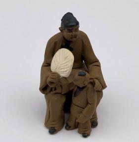 Ceramaic Figurine <br>Mom & Son Sitting On A Bench - 2.25