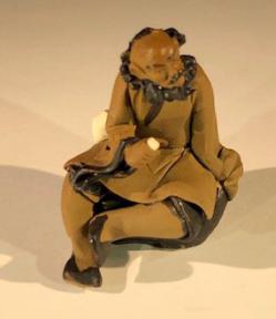 Ceramic Figurine -Mud Man Sitting with Cup - 2.5