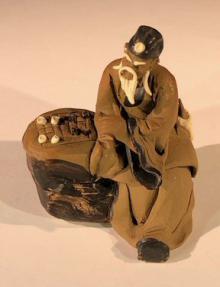 Ceramic Figurine<br> Mud Man Sitting On A Bench Playing Chess - 2.5