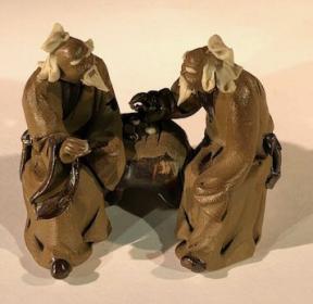 Ceramic Figurine<br>Two Mud Men Sitting On A Bench Playing Chess - 2.5