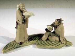 Miniature Ceramic Figurine <br>Two Mud Men On A Leaf, One Standing holding with Fan, The Other Sitting Reading a Book<br> - 3