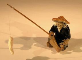 Miniature Ceramic Figurine - Glazed Fisherman <br>2 1/4
