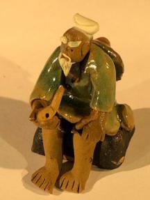 Miniature Ceramic Figurine<br><i></i>Man Holding a Pipe<br>2