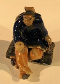 Miniature Ceramic Figurine<br><i></i>Man Holding Cup<br>2