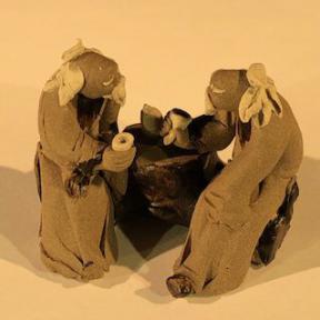 Miniature Ceramic Figurine<br>Two Mud Men Sitting On A Bench Drinking Tea - 1.5
