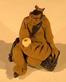 Miniature Ceramic Figurine - Mud Man Holding Cup - 1.5