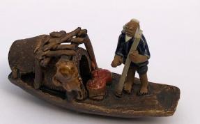 Ceramic Figurine<br>Man on Sampan Boat<br>3