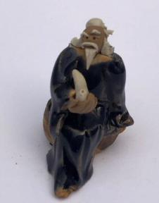 Miniature Ceramic Figurine<br>Man Holding Pipe - 2
