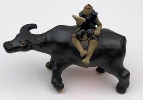 Ceramic Figurine<br>Boy Sitting On Standing Buffalo<br> Large - 3.5