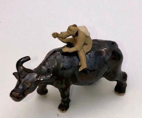 Ceramic Figure<br>Man Ridding on Buffalo<br>